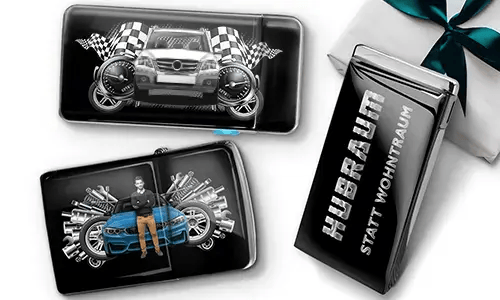 Gift set featuring car-themed metal cases with images of a green sports car, checkered flags, and engine motifs. Includes a 