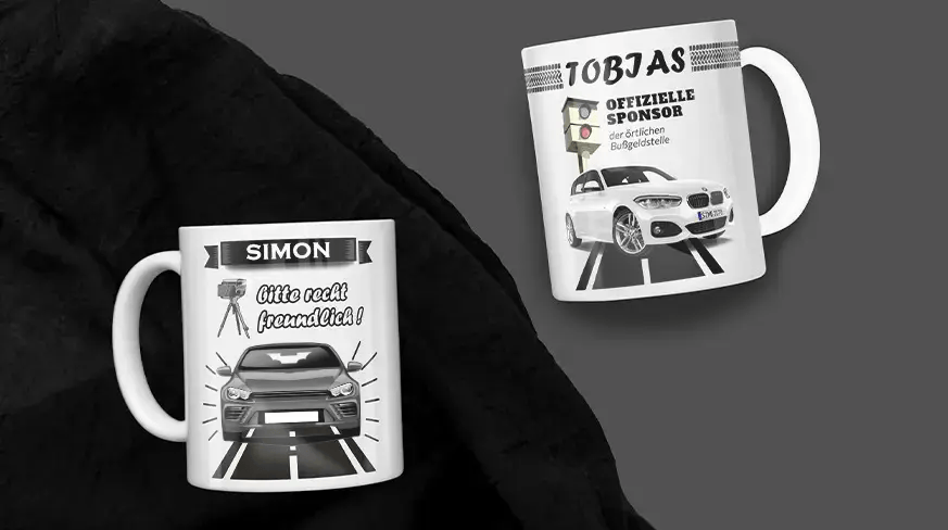 Two white mugs with car and speed camera prints: Simon's mug with friendly message, Tobias's mug with humorous fine office text
